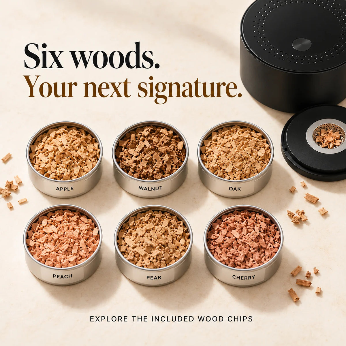 Six included wood-chip tins labeled Apple, Walnut, Oak, Peach, Pear and Cherry